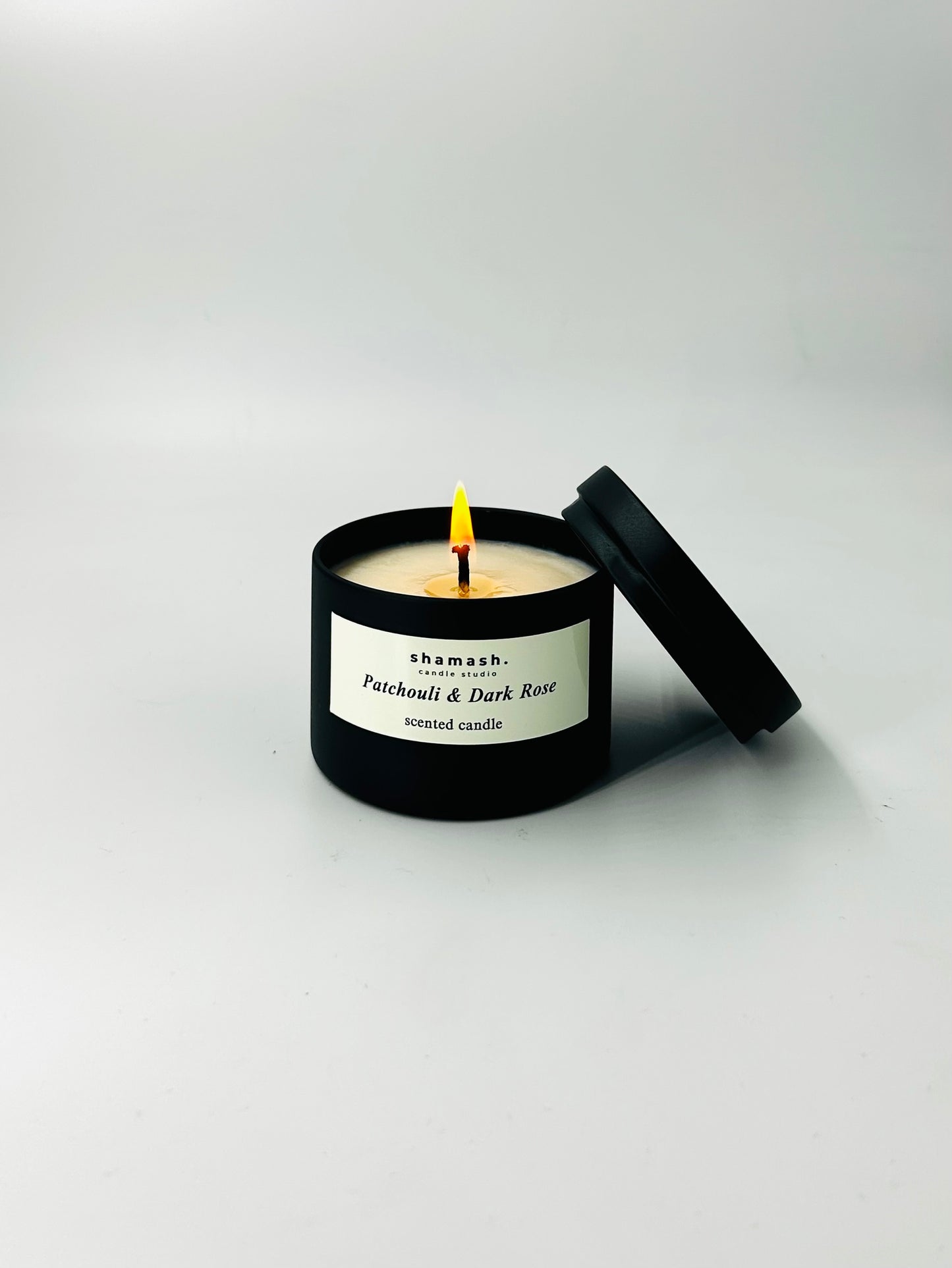 PATSOULI & DARK ROSE TRAVEL CANDLE - Noir