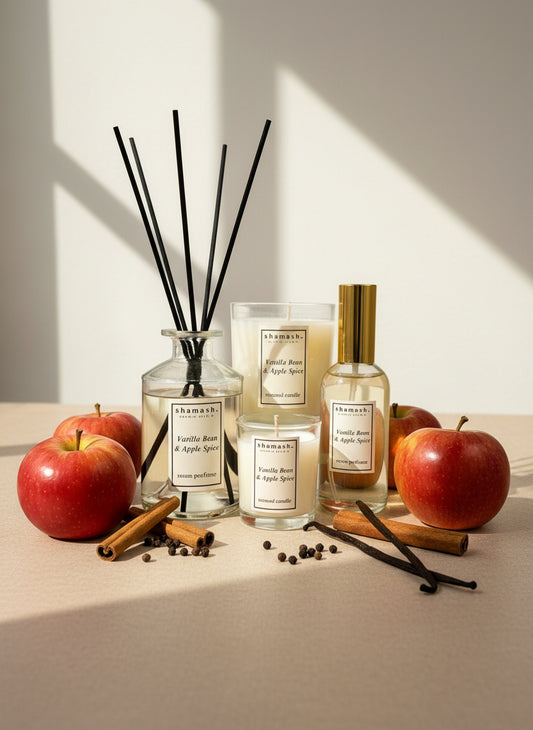 Shamash Vanilla Bean & Apple Spice products including candles and diffuser on a white background